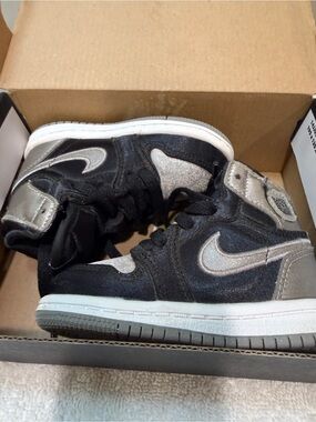 Nike Kids Black and Silver High-Top Sneakers with Metallic Accents